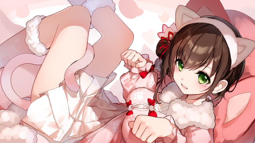 1girl :d animal_ears bison_cangshu blush bow breasts brown_hair cat_ears cat_tail fake_animal_ears feet_out_of_frame green_eyes hair_ribbon hairband highres large_breasts legs_up looking_at_viewer lying mole mole_under_eye on_back open_mouth original paw_pose pleated_skirt red_bow red_ribbon ribbon skirt smile tail