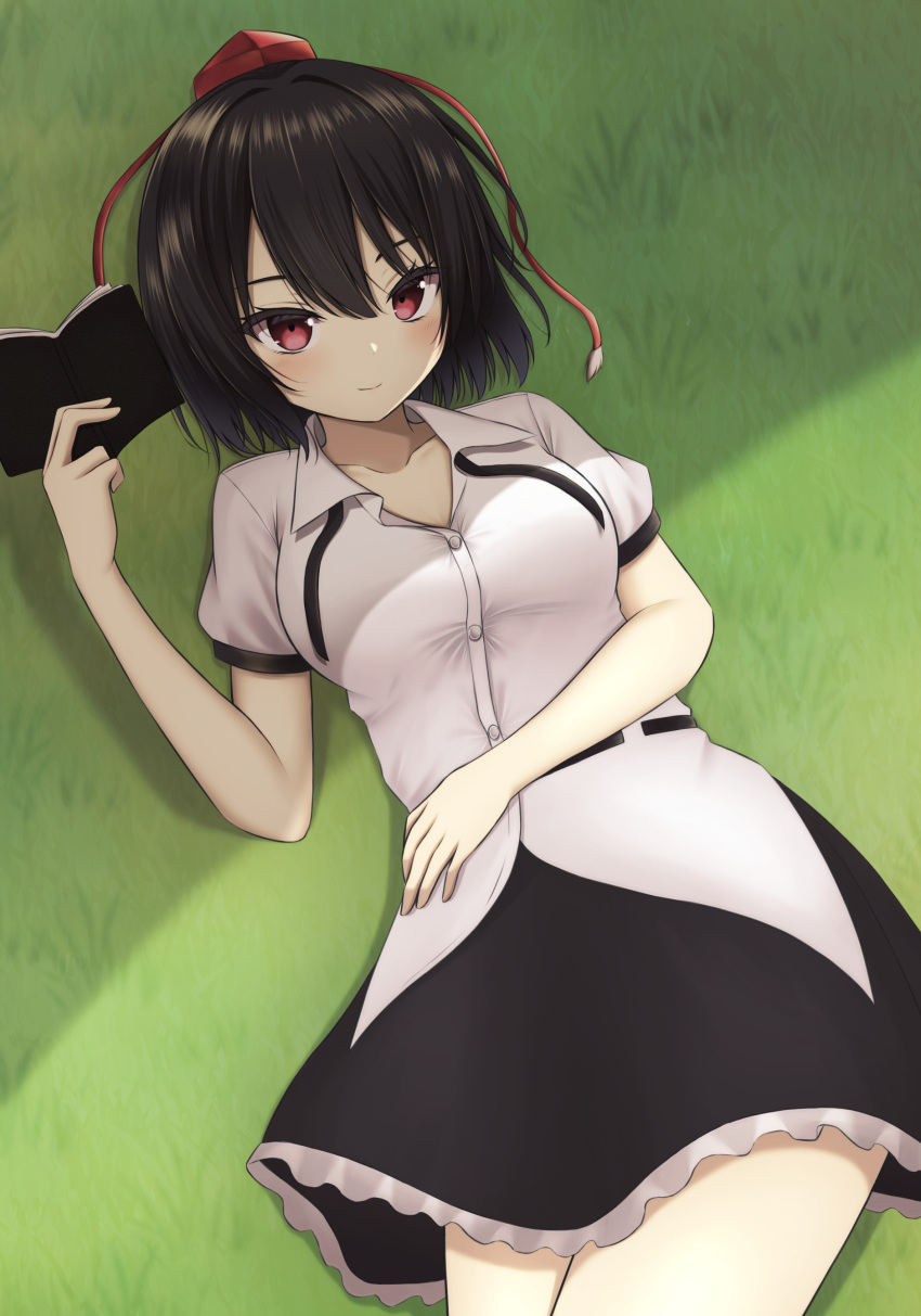 1girl absurdres bangs black_hair black_skirt blush breasts buttons closed_mouth collarbone commentary eyelashes frilled_skirt frills hair_between_eyes hand_on_own_stomach hand_up hat highres holding holding_notebook large_breasts looking_at_viewer lying medium_hair miniskirt notebook on_back on_grass puffy_short_sleeves puffy_sleeves red_eyes red_headwear ribbon-trimmed_shirt shameimaru_aya shirt short_sleeves skirt smile solo szl tokin_hat touhou white_shirt