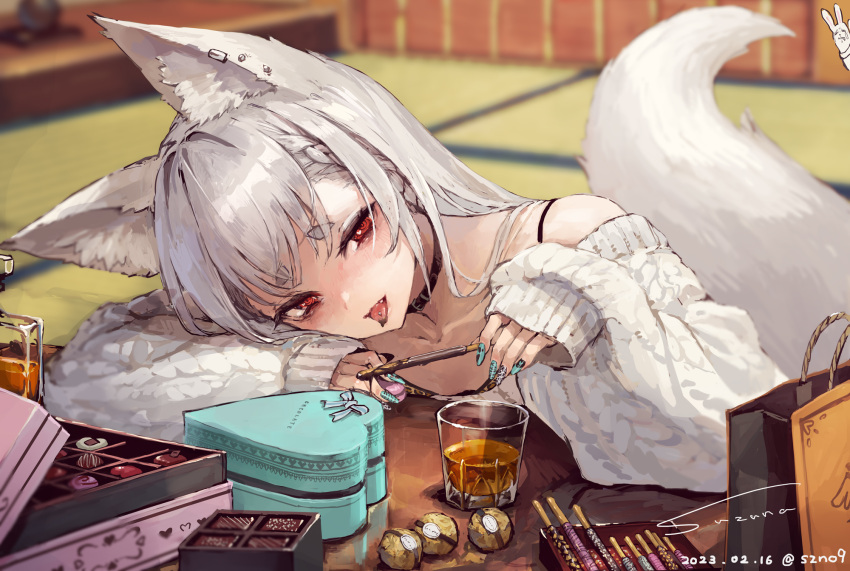 1girl animal_ear_fluff animal_ears aqua_nails arm_rest artist_name bag bangs bare_shoulders black_choker blurry box box_of_chocolates chocolate choker commentary cup dated depth_of_field drink fox_ears fox_tail head_rest head_tilt heart-shaped_box highres indoors kotatsu long_sleeves looking_at_viewer nail_polish off-shoulder_sweater off_shoulder original piercing red_eyes shopping_bag signature sleeves_past_wrists solo suzuno_(bookshelf) sweater symbol-only_commentary table tail tatami thick_eyebrows tongue tongue_out tongue_piercing white_hair
