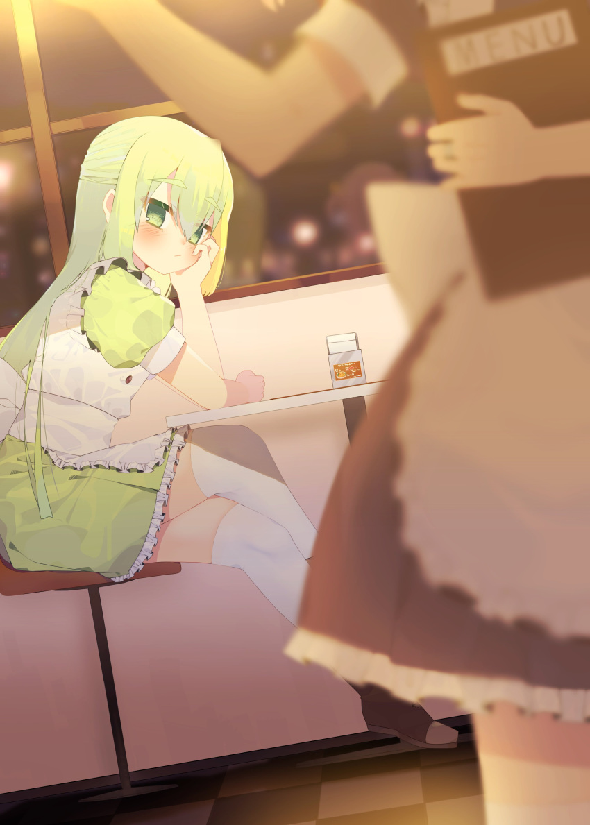 1girl absurdres alina_gray alternate_costume amane_hikari apron blonde_hair blurry blurry_foreground blush cafe dress green_dress green_hair hair_between_eyes hand_on_own_face highres indoors long_hair magia_record:_mahou_shoujo_madoka_magica_gaiden mahou_shoujo_madoka_magica maid_apron multicolored_hair on_chair puffy_short_sleeves puffy_sleeves short_sleeves sidelocks sitting straight_hair streaked_hair table thigh-highs white_thighhighs window