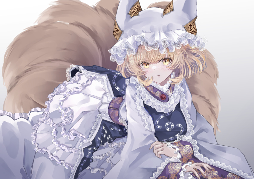 1girl animal_ears blonde_hair blush closed_mouth dress fingernails fox_ears fox_tail frilled_dress frilled_sleeves frills hat highres long_sleeves mob_cap multiple_tails sarasadou_dan short_hair simple_background solo tabard tail touhou white_background white_dress white_headwear wide_sleeves yakumo_ran yellow_eyes