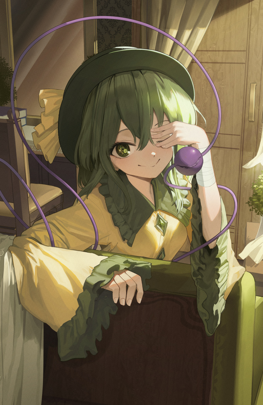 1girl absurdres bangs black_headwear book buttons chair closed_mouth collared_shirt commentary curtains diamond_button door eyeball frilled_shirt_collar frilled_sleeves frills goback green_eyes green_hair hair_between_eyes hat highres komeiji_koishi long_sleeves medium_hair one_eye_closed shirt smile solo third_eye touhou wide_sleeves yellow_shirt