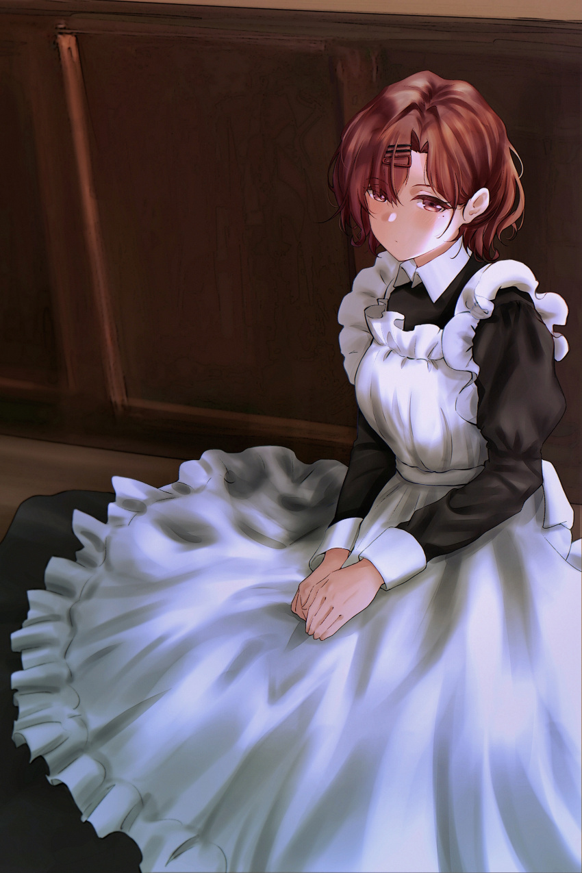 1girl absurdres alternate_costume apron black_dress blush brown_hair dress enmaided hair_ornament hairclip hairpin highres higuchi_madoka idolmaster idolmaster_shiny_colors indoors looking_at_viewer maid mole mole_under_eye mtoan own_hands_together pinafore_dress sitting solo wavy_hair white_apron