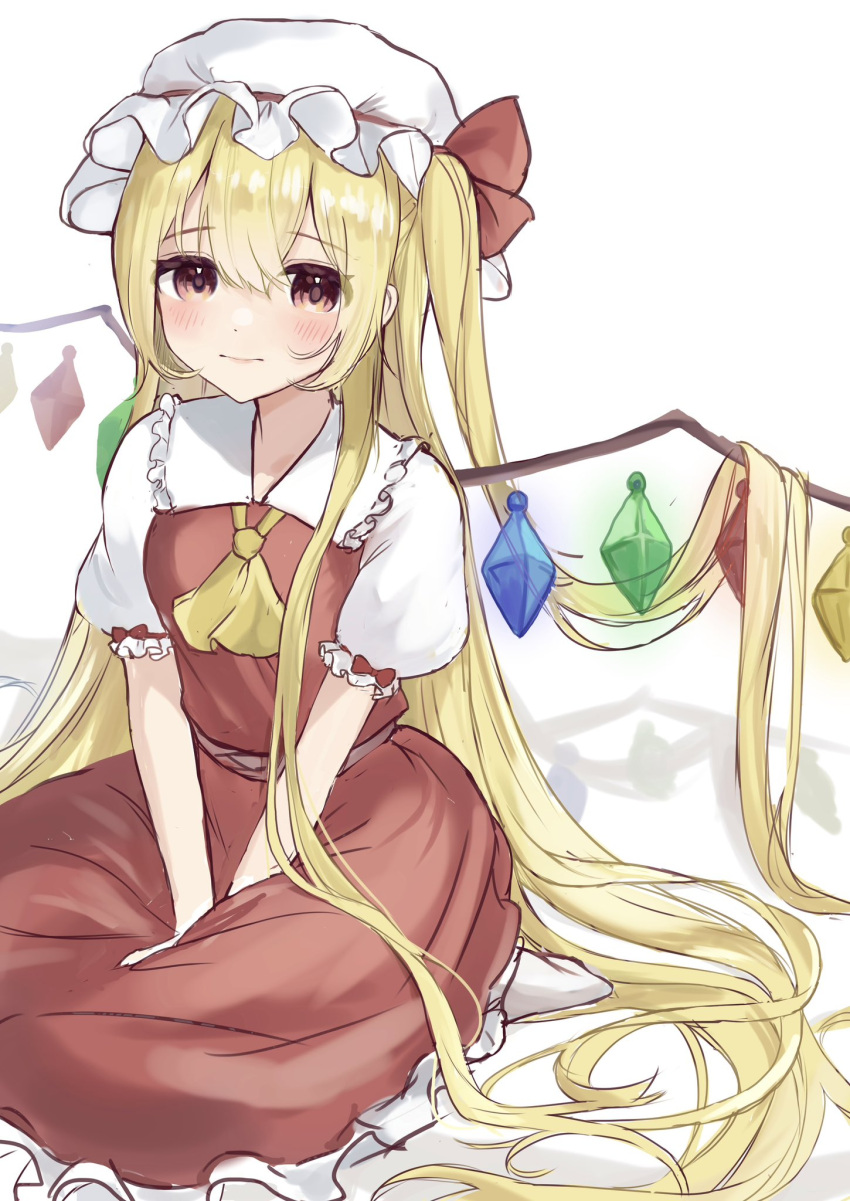 1girl absurdly_long_hair alternate_hair_length alternate_hairstyle ascot bangs blonde_hair blush breasts closed_mouth crystal eyes_visible_through_hair flandre_scarlet frilled_shirt_collar frills hair_between_eyes hands_on_lap hat highres light_smile long_hair looking_at_viewer mob_cap naarsann puffy_short_sleeves puffy_sleeves seiza short_sleeves sitting skirt small_breasts solo touhou v_arms very_long_hair white_headwear wings yellow_ascot