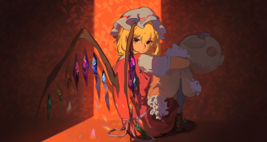 1girl absurdres bangs blonde_hair closed_mouth crystal flandre_scarlet full_body hat highres kino2435006 knees_up long_hair looking_at_viewer mary_janes mob_cap red_eyes red_footwear red_skirt red_vest shirt shoes short_sleeves sitting skirt socks solo stuffed_animal stuffed_toy tearing_up teddy_bear touhou vest white_shirt white_socks wings