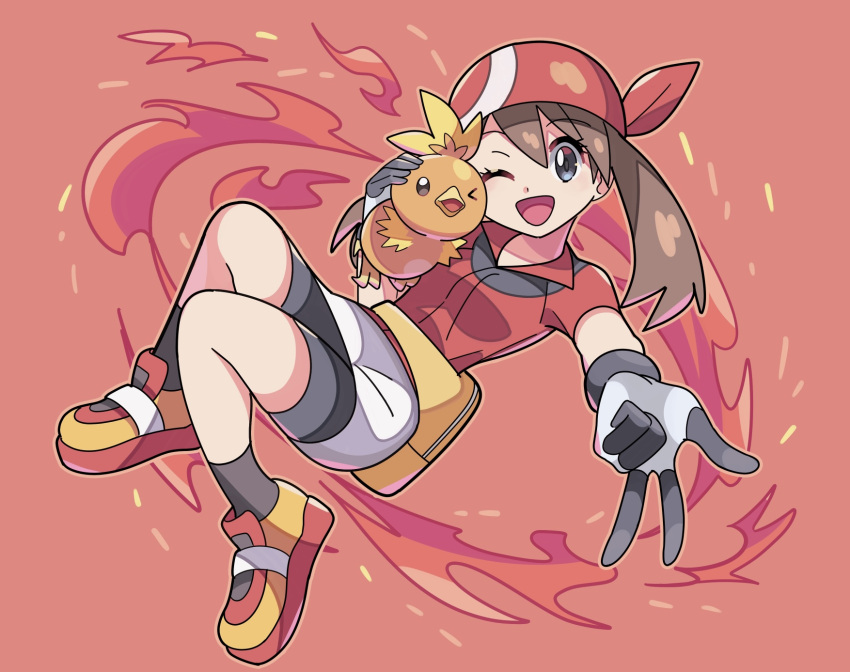 1girl ;d bandana bangs bike_shorts brown_hair collared_shirt commentary_request eyelashes gloves grey_eyes hand_up highres holding holding_pokemon looking_at_viewer may_(pokemon) one_eye_closed open_mouth pokemon pokemon_(creature) pokemon_(game) pokemon_rse red_bandana red_shirt shirt shoes short_sleeves skirt smile socks sutokame tongue torchic w white_skirt