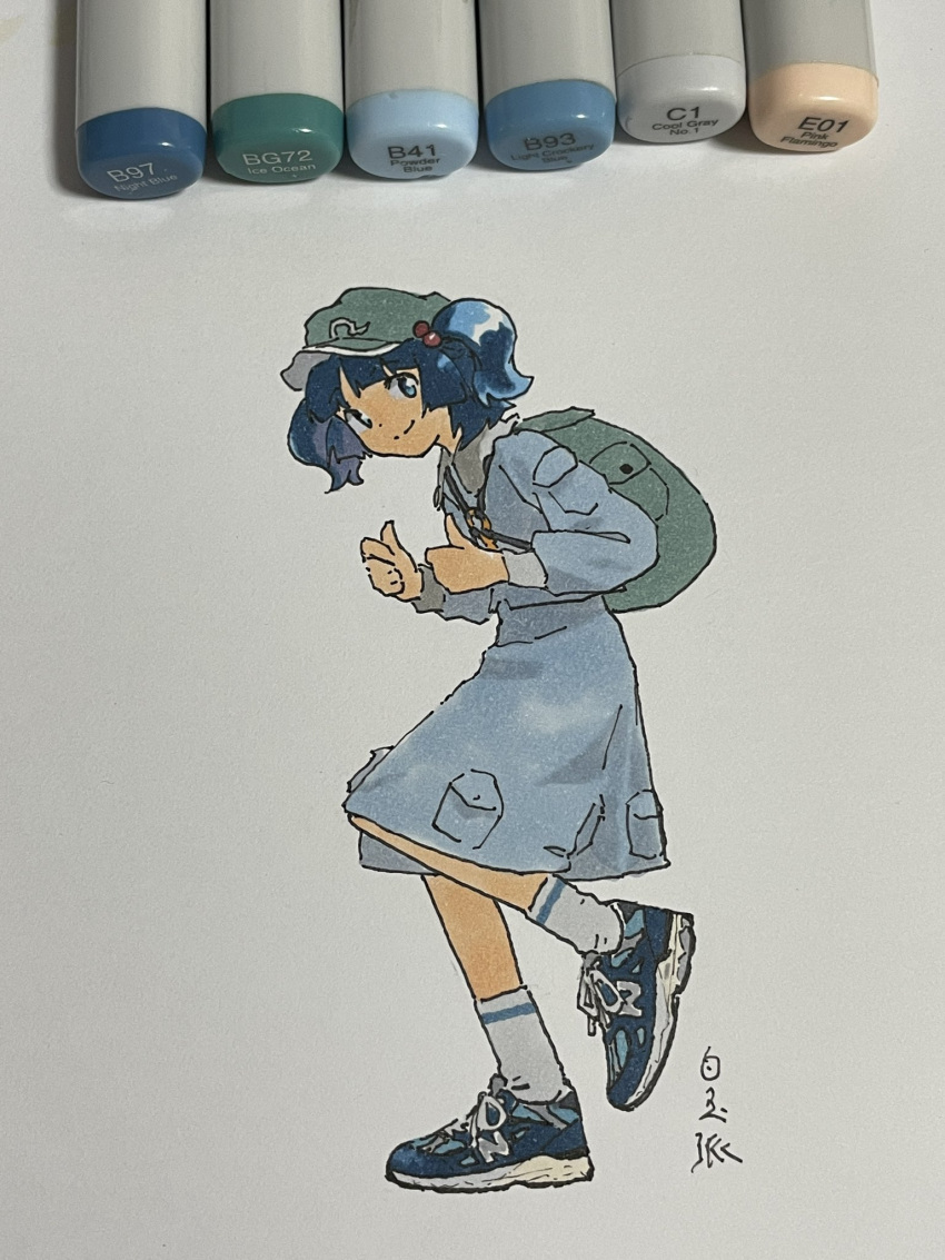 1girl artist_name backpack bag blue_eyes blue_footwear blue_hair blue_shirt blue_skirt collar frilled_collar frilled_shirt_collar frills green_headwear hair_bobbles hair_ornament hat highres kawashiro_nitori key long_sleeves marker marker_(medium) medium_hair new_balance paper photo_(medium) pocket shiratama_(hockey) shirt shoes signature single_horizontal_stripe single_stripe skirt skirt_set smile sneakers socks solo standing standing_on_one_leg thumbs_up touhou traditional_media two_side_up white_socks