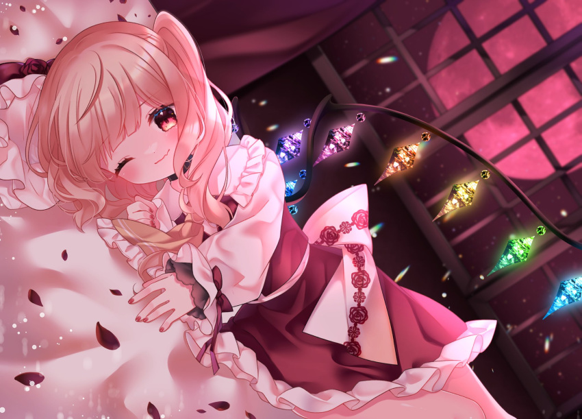 1girl ascot back_bow bat_wings blonde_hair blunt_bangs blush bow cacao_(cacaomgmg) closed_mouth collar commentary_request crystal darkness dutch_angle flandre_scarlet floral_print frilled_ascot frilled_collar frilled_skirt frills full_moon hat hat_removed headwear_removed highres long_hair long_sleeves looking_at_viewer lying mob_cap moon night on_bed on_side one_eye_closed petals rainbow_order red_eyes red_moon red_nails red_skirt red_vest rose_petals rose_print sailor_collar shirt side_ponytail skirt sky slit_pupils smile solo star_(sky) starry_sky third-party_source touhou vest wavy_hair white_bow white_headwear white_sailor_collar white_shirt window wings yellow_ascot