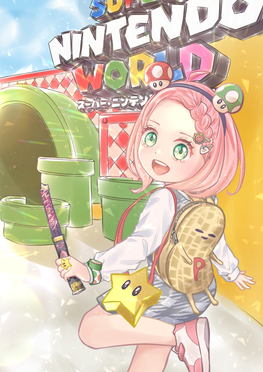 1girl ahoge alternate_hairstyle anya_(spy_x_family) backpack bag braid child commentary_request female_child green_eyes hair_ornament hairclip highres holding holding_wand kirara_(k43mf) knee_up long_sleeves looking_at_viewer medium_hair open_mouth pink_footwear pink_hair power_star_(mario) shirt shoes smile sneakers solo spy_x_family super_mushroom super_nintendo_world teeth upper_teeth_only wand white_shirt