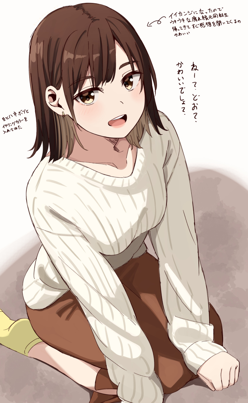 1girl :d ankle_socks arrow_(symbol) blush bob_cut breasts brown_eyes brown_hair brown_skirt collarbone commentary_request earrings highres jewelry kapatarou long_sleeves looking_at_viewer original ribbed_shirt shirt skirt sleeves_past_wrists small_breasts smile socks solo thick_eyebrows translation_request white_background white_shirt yellow_socks