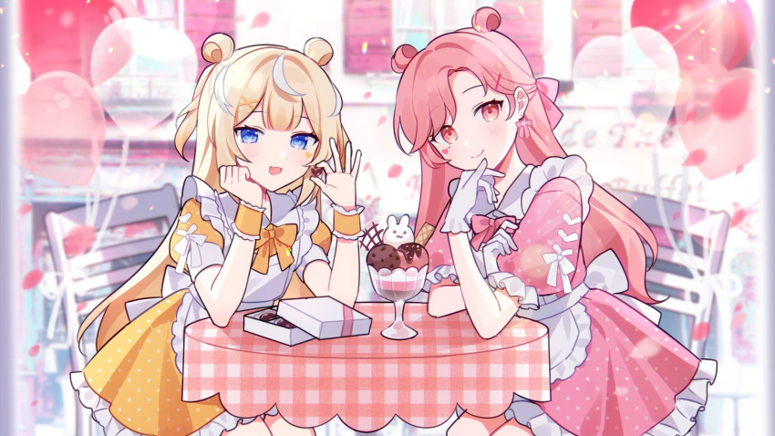 2girls apron balloon blue_eyes blurry blurry_background blush bow box candy chair chocolate double_bun dress facial_mark food frilled_apron frills hair_behind_ear hair_bun heart heart-shaped_chocolate heart_facial_mark highres holding holding_chocolate holding_food indie_virtual_youtuber looking_at_viewer luvdia multicolored_hair multiple_girls nini_yuuna orange_bow orange_dress pink_bow pink_dress pink_eyes pink_hair polka_dot polka_dot_dress second-party_source shabel_tonya sitting smile streaked_hair unmoving_pattern virtual_youtuber waka_(wk4444) white_apron white_hair