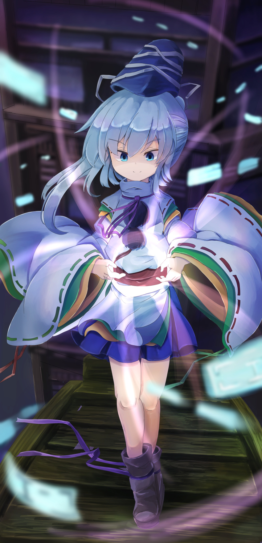 1girl absurdres blue_eyes blue_headwear blue_skirt boat boots brown_footwear closed_mouth commentary_request divine_spirit_mausoleum flat_chest full_body grey_hair hair_between_eyes hat highres japanese_clothes kariginu long_bangs long_hair long_sleeves looking_down mononobe_no_futo neck_ribbon pom_pom_(clothes) ponytail purple_ribbon ribbon ribbon-trimmed_sleeves ribbon_trim sensi_tobikage skirt smile solo spell_card tate_eboshi touhou watercraft wide_sleeves