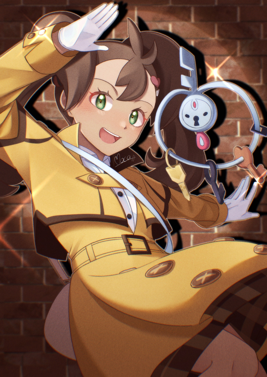 1girl :d arm_up blurry blurry_background blush brick_wall brown_hair brown_skirt buttons collared_shirt commentary_request eyelashes gloves green_eyes highres jacket klefki mocacoffee_1001 official_alternate_costume open_mouth pokemon pokemon_(creature) pokemon_(game) pokemon_masters_ex shauna_(pokemon) shauna_(special_costume)_(pokemon) shirt signature skirt smile teeth tongue twintails upper_teeth_only white_gloves white_shirt yellow_jacket