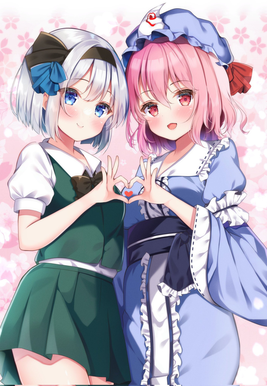 2girls :d black_bow black_bowtie black_hairband blue_eyes blue_headwear blue_kimono bow bowtie closed_mouth collared_shirt commentary_request cowboy_shot floral_background green_skirt green_vest grey_hair hairband hat heart heart_hands heart_hands_duo highres japanese_clothes kimono konpaku_youmu long_sleeves looking_at_viewer mob_cap multiple_girls open_mouth pink_background pink_hair red_eyes saigyouji_yuyuko shirotsuki_shirone shirt short_hair short_sleeves skirt smile touhou triangular_headpiece vest white_shirt wide_sleeves