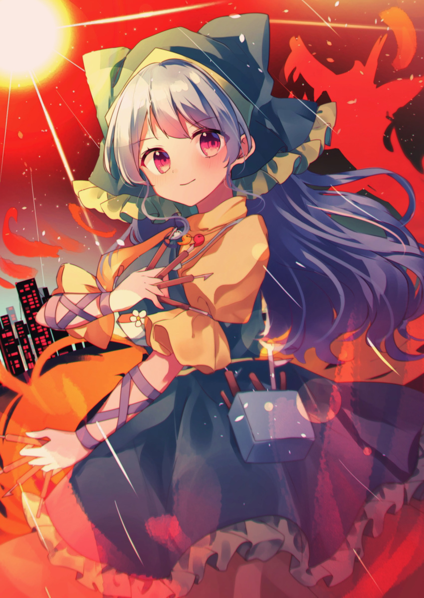 1girl absurdres apron blue_hair cityscape closed_mouth commentary_request green_apron green_headwear haniyasushin_keiki head_scarf highres jewelry looking_at_viewer magatama magatama_necklace moshihimechan necklace partial_commentary red_eyes short_sleeves smile solo touhou wood_carving_tool