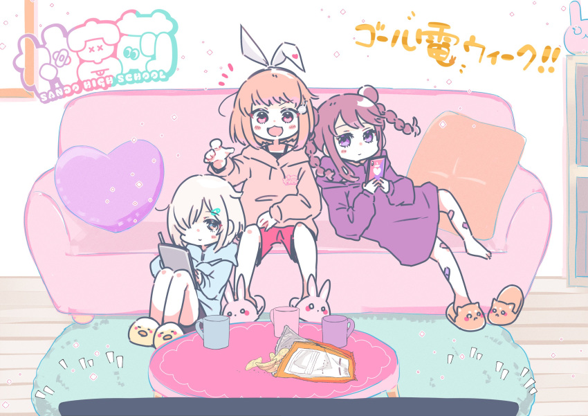 3girls animal_ears animal_slippers bandaid bandaid_on_leg blue_hoodie blush braid carpet couch cup denonbu double_bun fake_animal_ears hair_bun hairband heart heart_pillow highres holding holding_phone hood hood_down hoodie indoors inubousaki_shian kogata_nosuke long_sleeves looking_at_viewer minakami_hina mug multiple_girls on_couch open_mouth orange_hair phone pillow pink_eyes pink_hoodie pink_shorts purple_hair purple_hoodie rabbit_ears sakurano_mimito short_hair shorts sitting slippers smile tablet_pc twin_braids violet_eyes white_hairband