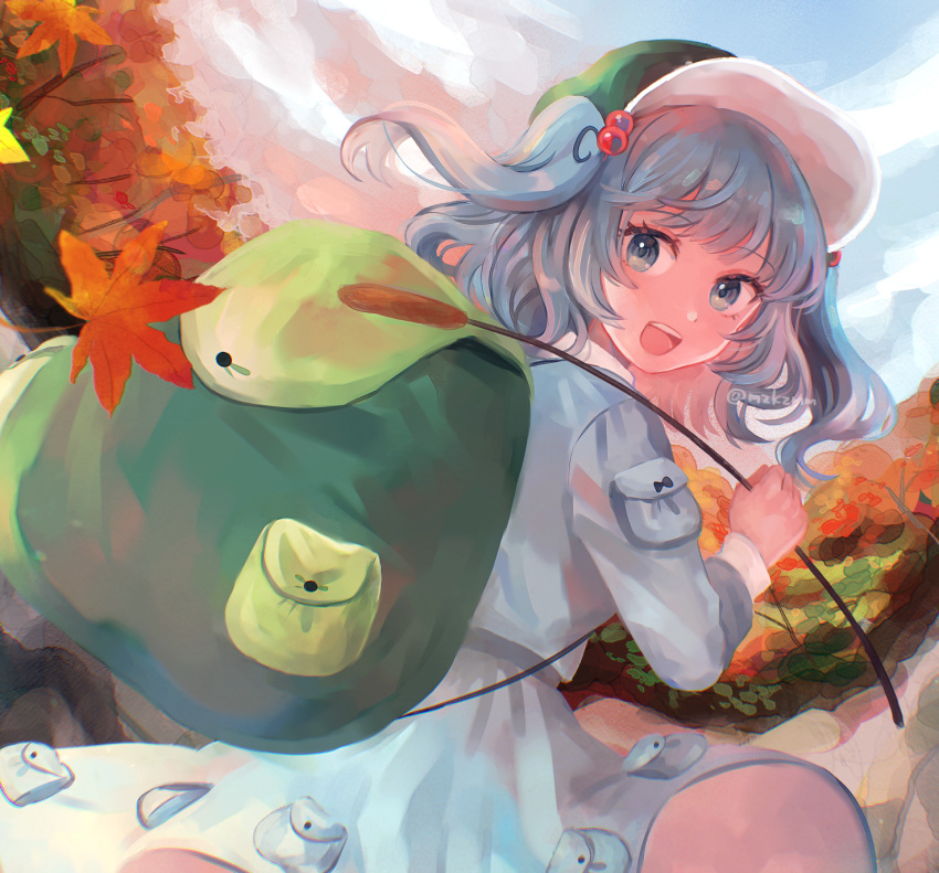 1girl :d backpack bag blue_eyes blue_shirt blue_skirt blunt_bangs day falling_leaves hair_bobbles hair_ornament highres holding holding_stick kawashiro_nitori leaf long_sleeves looking_at_viewer looking_back maple_leaf medium_hair mozukuzu_(manukedori) open_mouth outdoors shirt skirt skirt_pocket smile solo stick teeth touhou two_side_up upper_teeth_only