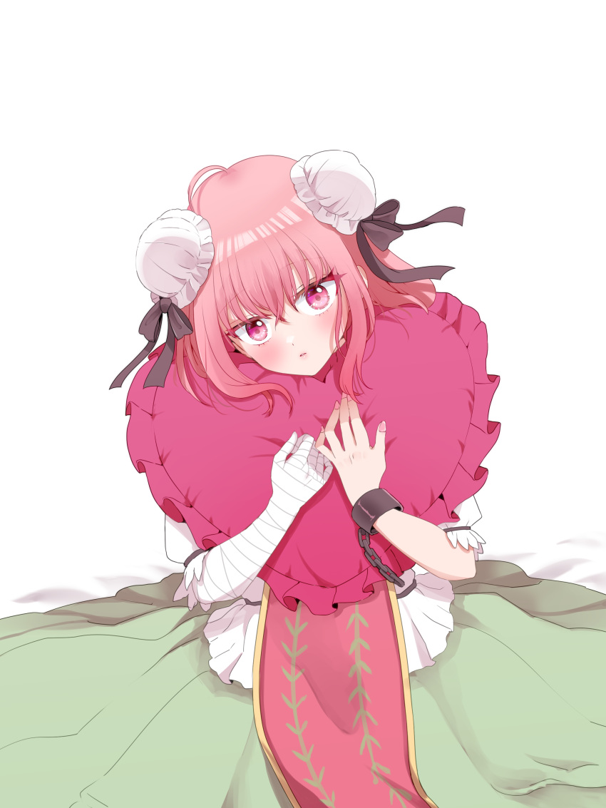 1girl absurdres ahoge bandaged_arm bandages bun_cover commentary_request cuffs double_bun green_skirt hair_bun heart heart_pillow highres ibaraki_kasen looking_at_viewer pillow pink_eyes pink_hair shackles shirt short_hair shouko_(airen) simple_background skirt solo tabard touhou white_background white_shirt