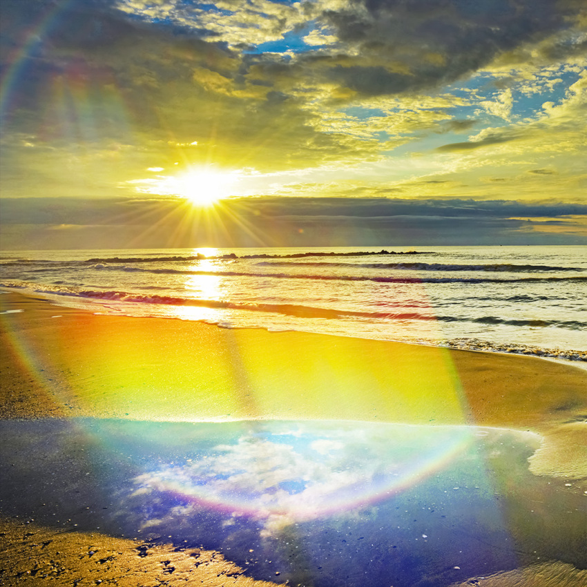 beach blue_sky clouds cloudy_sky horizon hoshiumisora light_rays morning no_humans ocean original rainbow reflection reflective_water sand scenery sky sun sunbeam sunlight sunrise water