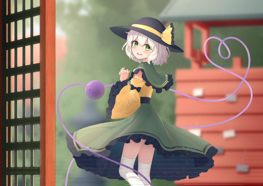 1girl :d absurdres black_bow black_headwear black_sash blurry blurry_background blush bow capelet detached_sleeves eyeball feet_out_of_frame frilled_capelet frilled_skirt frilled_sleeves frills green_capelet green_eyes green_skirt grey_hair hat hat_bow hat_ribbon heart heart_of_string highres komeiji_koishi long_sleeves looking_at_viewer medium_hair open_mouth ribbon sash shirt skirt sleeve_bow smile solo standing teeth thigh-highs third_eye touhou upper_teeth_only white_thighhighs wide_sleeves wrainman yellow_bow yellow_ribbon yellow_shirt yellow_sleeves