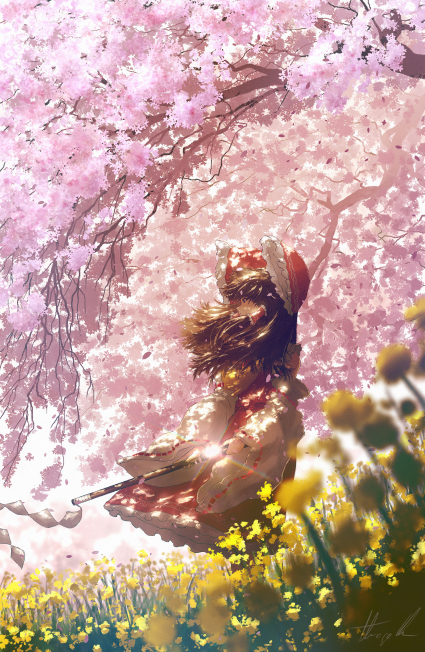 1girl absurdres blurry bow brown_eyes brown_hair cherry_blossoms commentary depth_of_field field flower flower_field from_side full_body gohei hair_bow hair_tubes hakurei_reimu highres holding medium_hair mixed-language_commentary oubachiago outdoors parted_lips procreate_(medium) red_bow ribbon-trimmed_sleeves ribbon_trim scenery shide sidelocks solo spring_(season) standing touhou