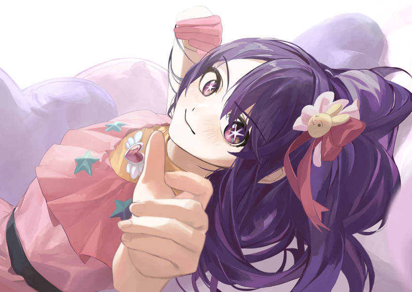 1girl absurdres belt black_belt blurry blush brooch closed_mouth commentary depth_of_field dress frilled_dress frills gloves hair_between_eyes hair_ornament heart heart_brooch heart_pillow highres hoshino_ai_(oshi_no_ko) idol idol_clothes jewelry long_hair lying multicolored_eyes omizu_03 on_back oshi_no_ko pillow pink_dress pink_eyes pink_gloves pink_ribbon purple_hair rabbit_hair_ornament reaching reaching_towards_viewer ribbon sidelocks single_glove solo star-shaped_pupils star_(symbol) symbol-shaped_pupils turtleneck_dress violet_eyes