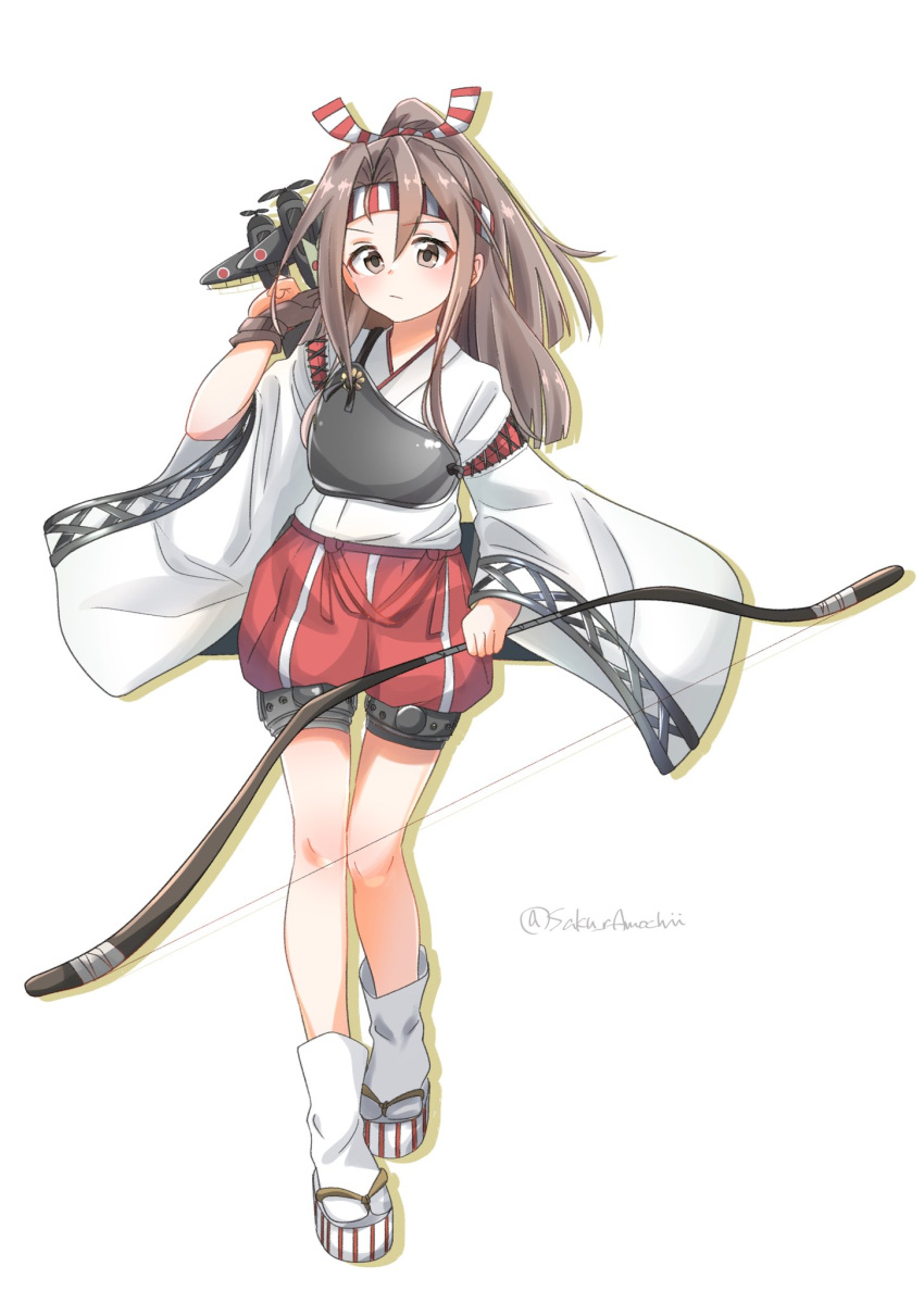 1girl aircraft blush bow_(weapon) brown_eyes brown_gloves closed_mouth full_body gloves hachimaki hair_between_eyes headband high_ponytail highres holding holding_bow_(weapon) holding_weapon japanese_clothes kantai_collection kimono light_brown_hair long_hair long_sleeves muneate no_chi_(aka_hara) partially_fingerless_gloves red_shorts shorts simple_background socks solo tabi twitter_username weapon white_background white_kimono white_socks wide_sleeves yugake zuihou_(kancolle)