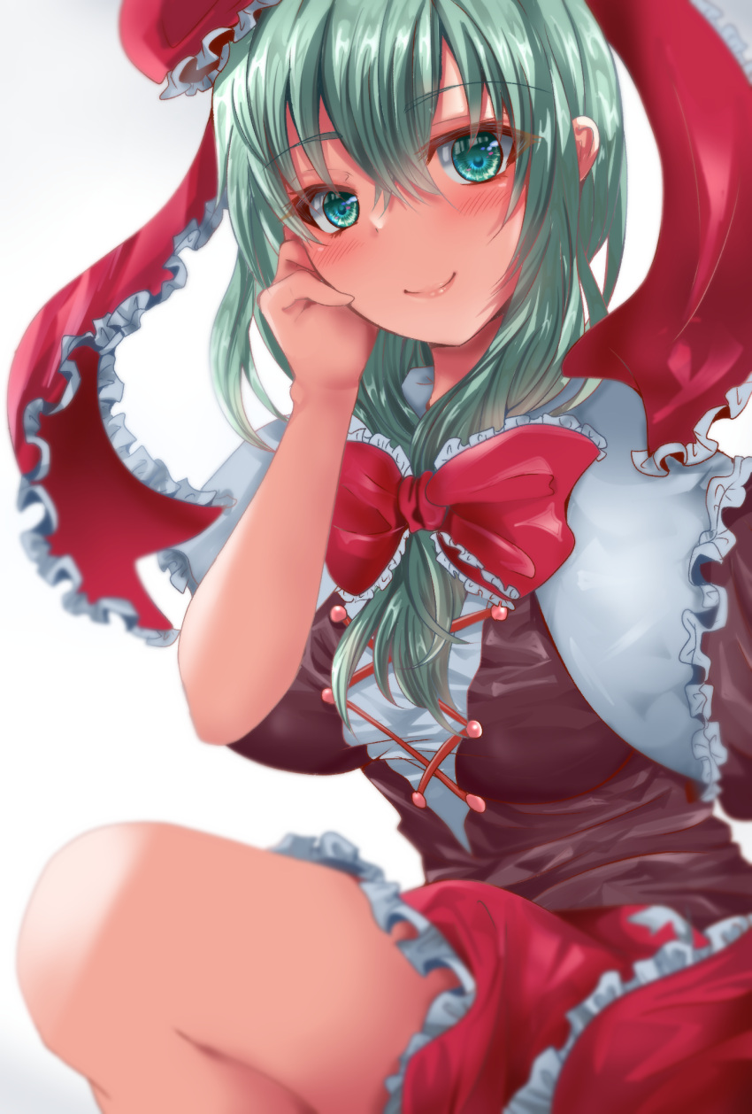 1girl bow breasts closed_mouth commentary_request cross-laced_clothes frills front_ponytail green_eyes green_hair guchadoro hair_bow hair_ribbon highres kagiyama_hina large_breasts long_hair looking_at_viewer red_bow red_ribbon ribbon simple_background smile solo touhou white_background