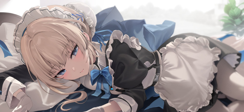 1girl apron black_dress blonde_hair blue_archive blue_bow blue_bowtie blue_eyes blue_ribbon blush bow bowtie breasts bun_cover closed_mouth dress frilled_apron frills hair_bun highres juliet_sleeves lips long_sleeves looking_at_viewer lying maid maid_headdress medium_breasts on_stomach puffy_sleeves ribbon short_hair solo toki_(blue_archive) white_apron zerocat
