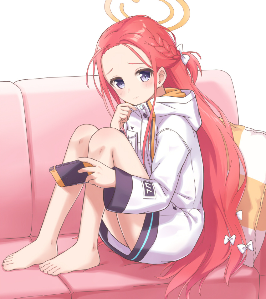 bare_legs barefoot blue_archive blue_eyes blush couch feet hair_ribbon halo handheld_game_console highres holding holding_handheld_game_console knees_up long_hair long_sleeves looking_at_viewer machikado no_shoes on_couch pillow redhead ribbon sitting very_long_hair yuzu_(blue_archive)