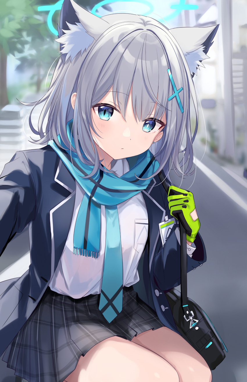 1girl absurdres animal_ear_fluff animal_ears bag blue_archive blue_eyes blue_jacket blue_necktie blue_scarf blurry blurry_background blush breast_pocket chocola_vt closed_mouth cross_hair_ornament earrings extra_ears gloves green_gloves grey_hair hair_ornament halo highres jacket jewelry looking_at_viewer medium_hair miniskirt mismatched_pupils necktie open_clothes open_jacket outdoors plaid plaid_skirt pleated_skirt pocket scarf school_bag school_uniform shiroko_(blue_archive) shirt shirt_tucked_in shoulder_bag sidelocks skirt solo striped striped_scarf stud_earrings white_shirt wolf_ears