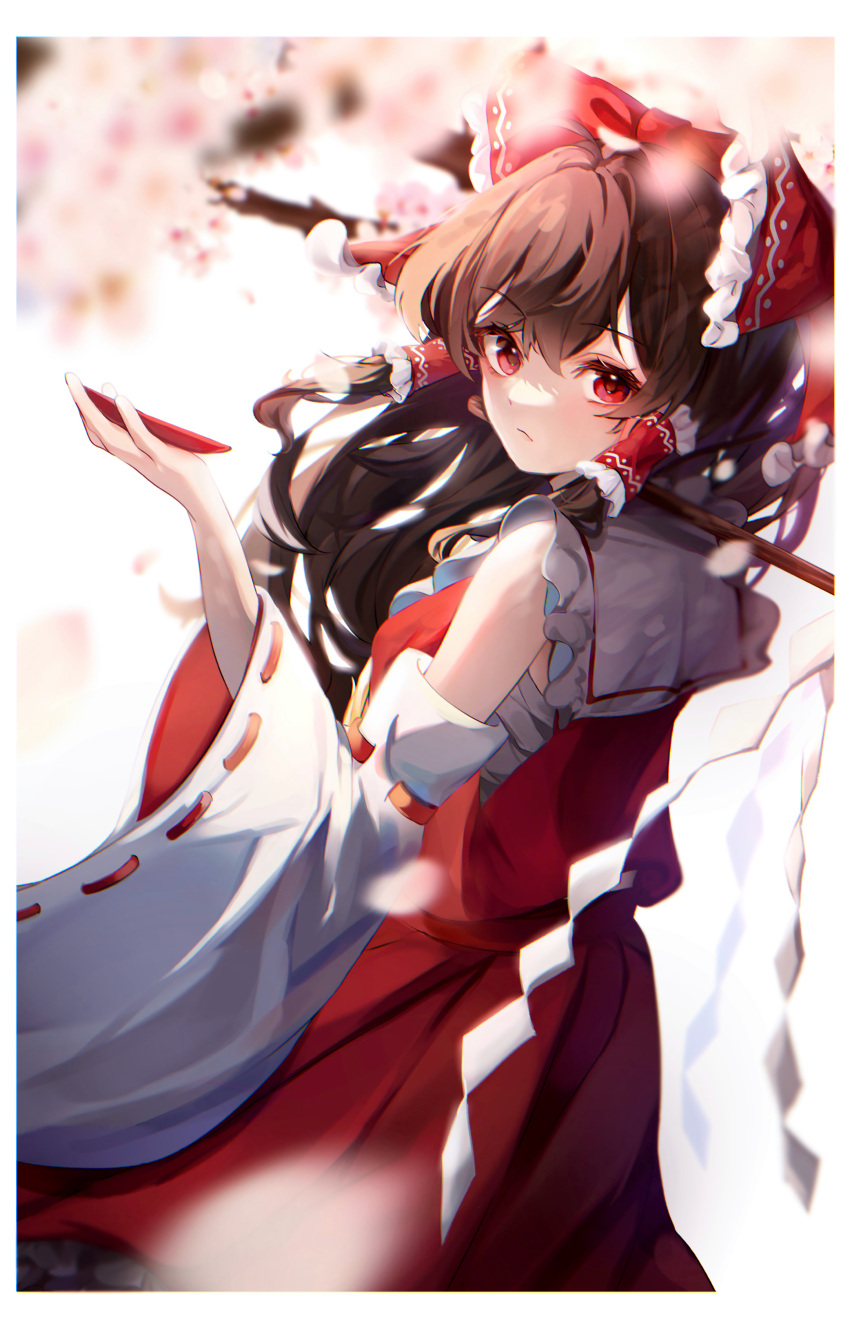 1girl absurdres bare_shoulders blurry blurry_foreground border brown_hair cup depth_of_field detached_sleeves hair_between_eyes hakurei_reimu hand_up highres holding holding_cup looking_at_viewer looking_back red_eyes sakazuki sarashi solo touhou user_dmug7842 white_border