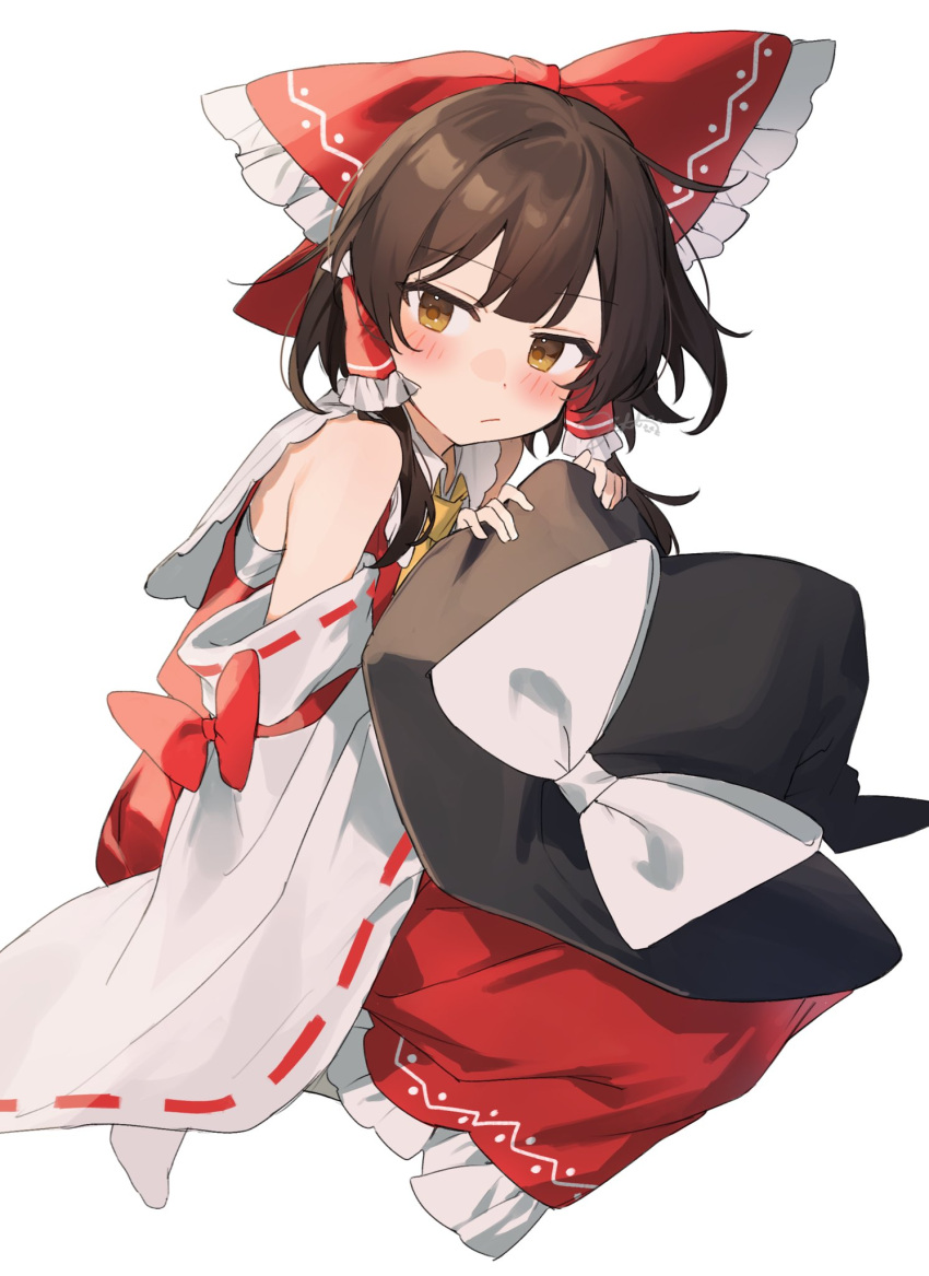 1girl artist_name ascot black_headwear blush bow brown_eyes brown_hair closed_mouth collared_dress detached_sleeves dress frills hair_bow hair_ornament hair_tubes hakurei_reimu hands_up hat hat_bow highres holding holding_clothes holding_hat jill_07km long_sleeves looking_to_the_side no_shoes red_bow red_dress seiza short_hair simple_background sitting socks solo touhou white_background white_bow white_socks wide_sleeves witch_hat yellow_ascot