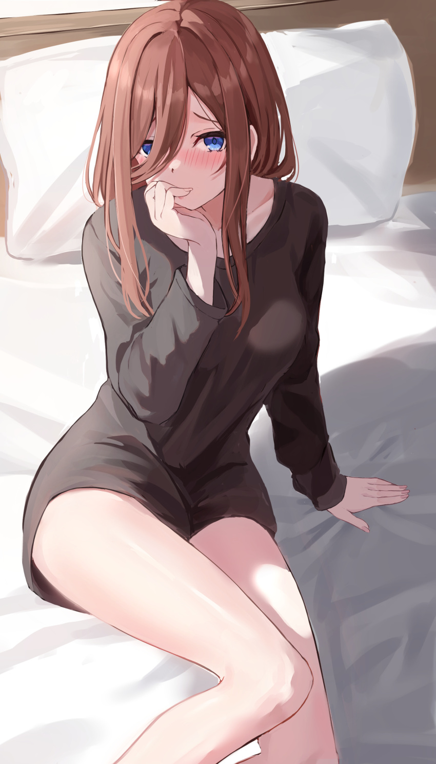 1girl absurdres arm_support bare_legs black_dress blue_eyes blush breasts brown_hair collarbone covering_mouth dress eyelashes fingernails from_above furrowed_brow go-toubun_no_hanayome hair_between_eyes hair_over_one_eye hand_on_own_chin hand_up highres indoors large_breasts legs long_hair long_sleeves looking_at_viewer nakano_miku nose_blush on_bed raikun_raikun shiny_skin shy sidelocks sitting solo straight_hair thighs