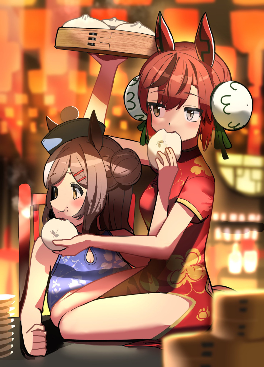 2girls alternate_costume alternate_hairstyle animal_ears baozi blurry blurry_background blurry_foreground brown_hair chinese_clothes commentary_request detached_sleeves double_bun eating food hair_bun highres horse_ears horse_tail looking_at_another looking_at_viewer matikane_tannhauser_(umamusume) multiple_girls nice_nature_(umamusume) official_alternate_costume redhead sitting tail takuan_(taku1219oekaki) umamusume