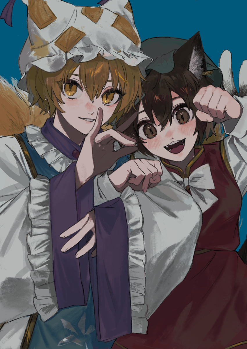 2girls :d absurdres blonde_hair blue_background blush bow bowtie breasts brown_eyes brown_hair cat_tail chen commentary_request fingernails fox_shadow_puppet fox_tail gold_trim gotagotay hair_between_eyes hands_up happy hat highres long_sleeves looking_at_viewer mob_cap multiple_girls multiple_tails nekomata nose_blush nostrils open_mouth paw_pose red_vest short_hair simple_background small_breasts smile tail teeth touhou two_tails vest white_bow white_bowtie yakumo_ran yellow_eyes