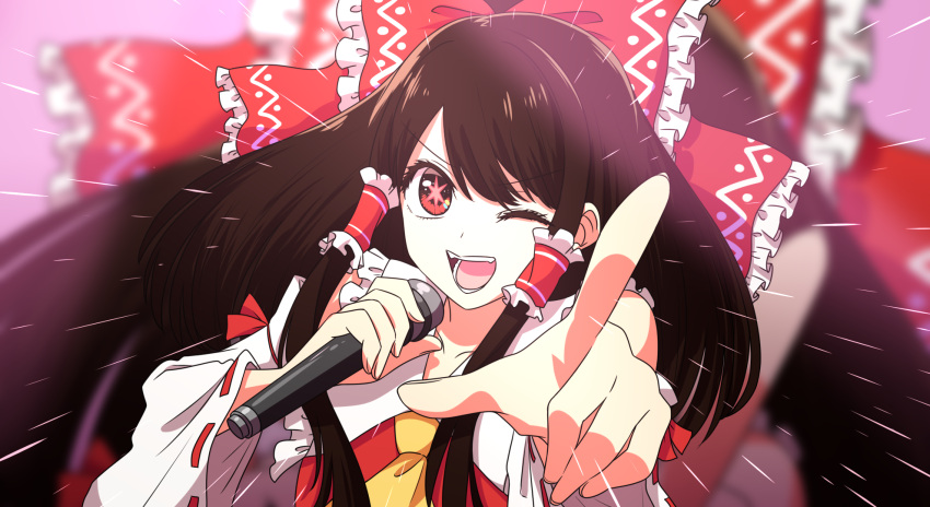 1girl ascot black_hair bow derivative_work detached_sleeves fantouhoumusic frills hair_bow hakurei_reimu highres holding holding_microphone idol_(yoasobi) japanese_clothes looking_at_viewer microphone miko open_mouth oshi_no_ko parody pointing pointing_at_viewer red_bow red_eyes sidelocks smile solo star-shaped_pupils star_(symbol) symbol-shaped_pupils touhou upper_body yellow_ascot yoasobi
