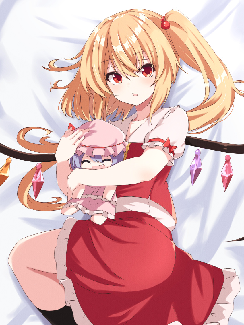 1girl absurdres ascot black_socks blonde_hair blush collarbone crystal doll_hug flandre_scarlet flat_chest from_above hair_between_eyes highres holding looking_at_viewer lying no_headwear object_hug on_bed on_side open_mouth puffy_short_sleeves puffy_sleeves red_eyes red_skirt red_vest remilia_scarlet remiria100 short_hair_with_long_locks short_sleeves side_ponytail skirt socks solo touhou vest wings
