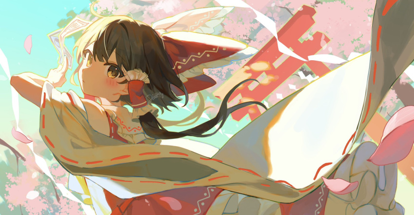 1girl bare_shoulders blush bow brown_eyes brown_hair cherry_blossoms closed_mouth detached_sleeves frilled_skirt frills hair_bow hair_tubes hakurei_reimu highres japanese_clothes jill_07km medium_hair nontraditional_miko ofuda petals red_bow red_skirt ribbon-trimmed_sleeves ribbon_trim sidelocks skirt solo touhou white_sleeves wide_sleeves