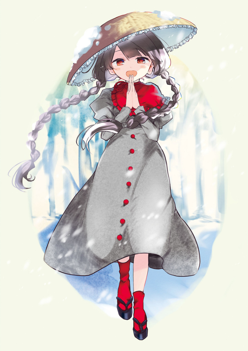 1girl ajirogasa black_hair braid brown_headwear buttons capelet dress frilled_hat frills grey_dress hat highres long_earlobes long_hair long_sleeves open_mouth own_hands_together palms_together poprication red_capelet red_eyes sandals smile snow snow_on_headwear solo strange_creators_of_outer_world touhou twin_braids yatadera_narumi