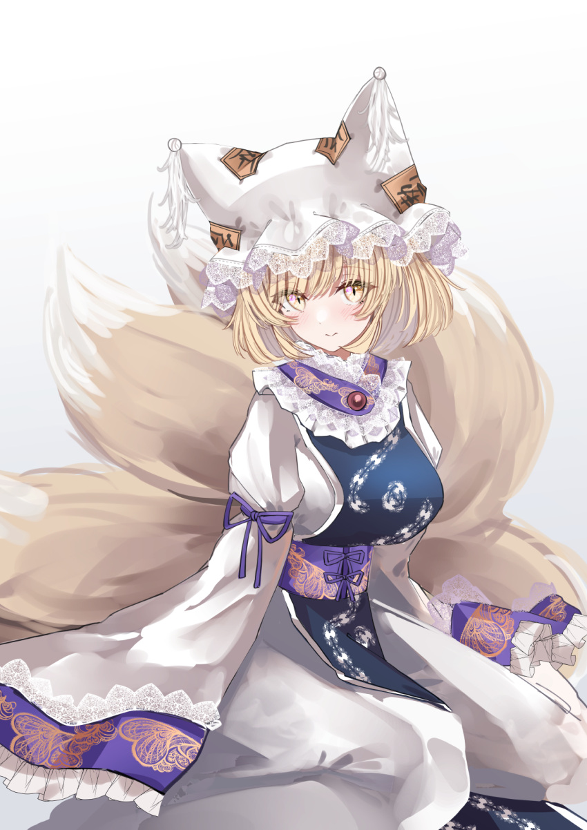 1girl animal_ears blonde_hair blush breasts closed_mouth dress fox_ears fox_tail frilled_sleeves frills hat highres large_breasts looking_at_viewer mob_cap multiple_tails sarasadou_dan short_hair simple_background sleeve_garter sleeves_past_fingers sleeves_past_wrists solo tabard tail touhou white_background white_dress white_headwear wide_sleeves yakumo_ran yellow_eyes