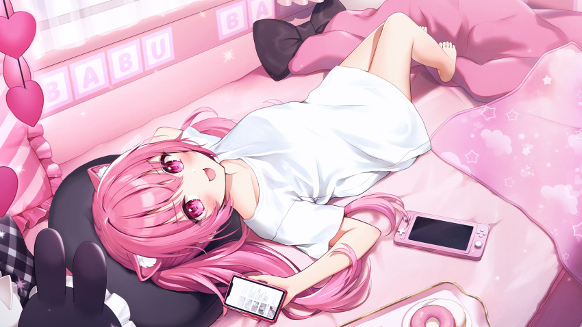 1girl :d animal_ears bare_legs barefoot cat_ears cat_girl cellphone doughnut feet food full_body heppoko_babutaro highres indie_virtual_youtuber knee_up legs long_hair looking_at_viewer lying momoshiki_tsubaki nintendo_switch no_pants on_back on_bed open_mouth phone pink_eyes pink_hair second-party_source shirt smartphone smile toes tray twintails virtual_youtuber white_shirt