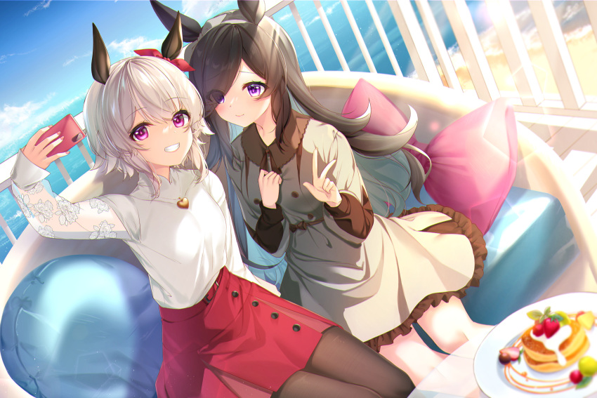 2girls animal_ears breasts brown_dress brown_hair brown_pantyhose cellphone closed_mouth clouds commentary couch curren_chan_(umamusume) dress feet_out_of_frame food grey_hair grin hair_over_one_eye highres holding holding_phone horizon horse_ears jewelry long_hair multiple_girls necklace ocean outdoors pancake pantyhose phone pillow plate red_skirt rice_shower_(umamusume) rukinya_(nyanko_mogumogu) selfie shirt shirt_tucked_in short_hair sitting skirt sleeves_past_wrists small_breasts smartphone smile symbol-only_commentary table umamusume v violet_eyes white_shirt
