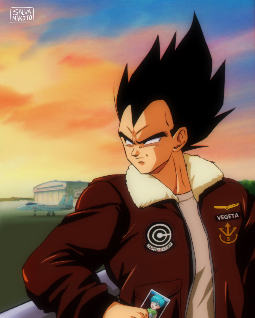 1boy absurdres aircraft airplane black_eyes black_hair brown_jacket bulma capsule_corp character_name commentary_request cosplay dragon_ball dragon_ball_z furrowed_brow hangar highres holding holding_photo jacket jet male_focus official_style orange_sky pete_"maverick"_mitchell pete_"maverick"_mitchell_(cosplay) photo_(object) salvamakoto signature sky solo spanish_commentary top_gun upper_body vegeta widow's_peak