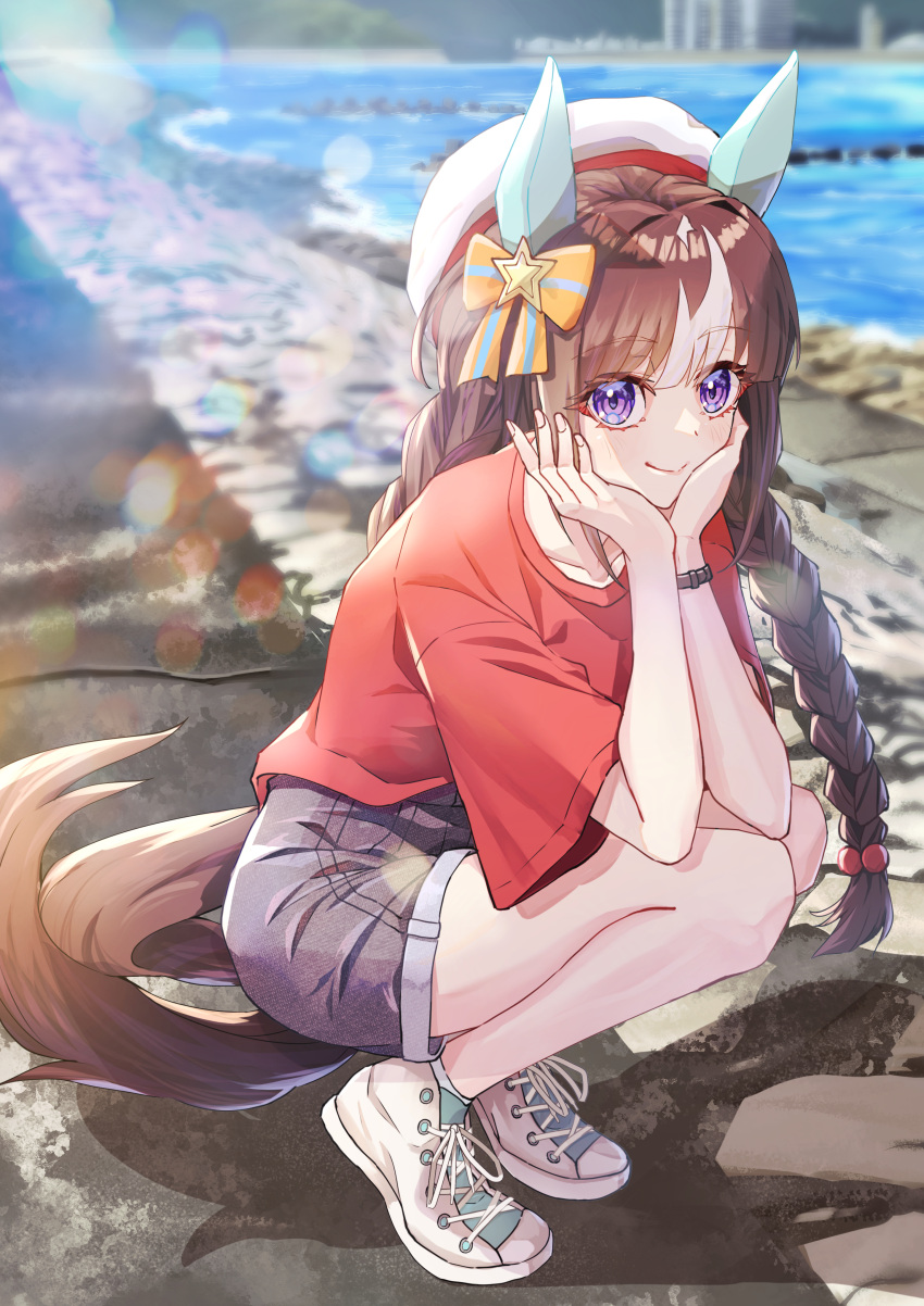 1girl absurdres alternate_costume animal_ears beret black_shorts blurry blurry_background bow braid brown_hair casual closed_mouth day ear_covers full_body hair_bobbles hair_bow hair_ornament hands_on_own_cheeks hands_on_own_face hat highres hokko_tarumae_(umamusume) horse_ears horse_girl horse_tail kento_(kentdrawing) lens_flare multicolored_hair outdoors red_shirt shirt shoes short_sleeves shorts smile sneakers solo squatting streaked_hair tail twin_braids umamusume violet_eyes white_headwear