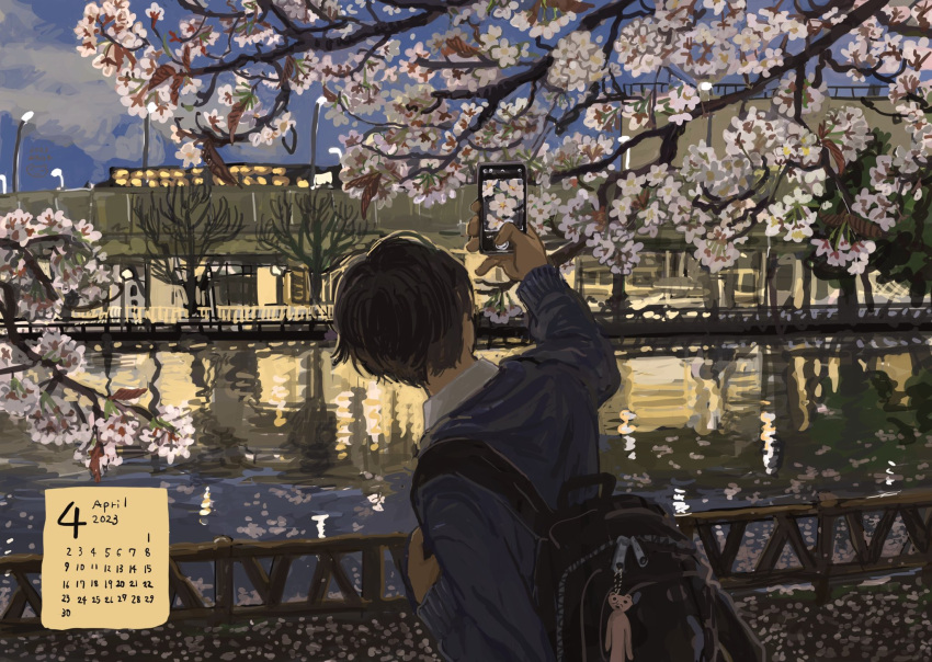 1boy april backlighting backpack bag bag_charm black_bag black_hair blue_sweater branch calendar_(medium) cellphone charm_(object) cherry_blossoms collared_shirt commentary_request facing_away from_behind hanami highres holding_strap lamppost long_sleeves male_focus minahamu original outdoors phone reflection reflective_water river scenery shirt short_hair single_strap smartphone sweater taking_picture twilight upper_body water