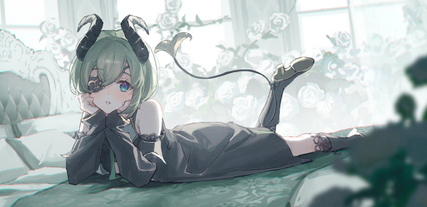 1girl bed black_dress black_footwear blue_eyes boots curled_horns detached_sleeves dress eyepatch green_hair hands_on_own_cheeks hands_on_own_face highres honey_strap horns nanashi_inc. oyuyu sekishiro_mico short_hair solo tail virtual_youtuber