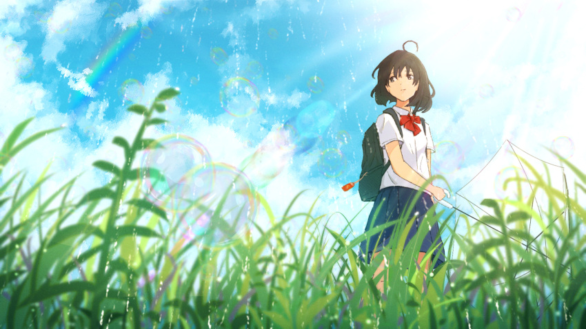 1girl ahoge backpack bag bag_charm black_skirt blue_sky bow bowtie brown_eyes brown_hair charm_(object) closed_mouth clouds cloudy_sky collared_shirt day dot_nose feet_out_of_frame grass hair_between_eyes highres holding holding_umbrella landscape lens_flare light_rays looking_to_the_side nature oka_kojiro original outdoors plant pleated_skirt rain red_bow red_bowtie scenery shirt short_hair short_sleeves sidelocks skirt sky smile solo sun umbrella white_shirt
