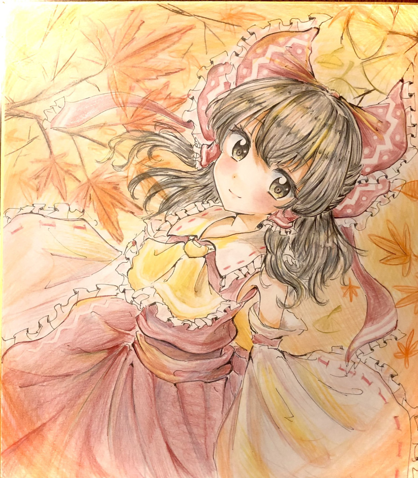 1girl ascot autumn_leaves brown_hair collar detached_sleeves dress frills hair_ribbon hair_tubes hakurei_reimu highres leaf light_smile looking_at_viewer maple_leaf nontraditional_miko orange_background orya_422 red_dress red_ribbon ribbon sleeveless solo touhou wide_sleeves yellow_ascot
