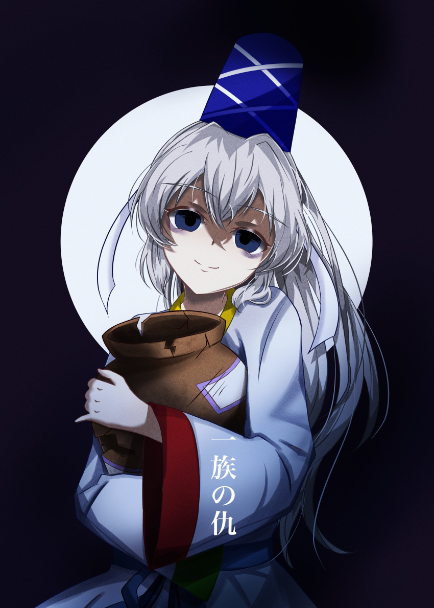 1girl absurdres bags_under_eyes blue_eyes blue_headwear closed_mouth commentary_request cowboy_shot empty_eyes grey_hair hair_between_eyes hat highres holding_storage_pot japanese_clothes kariginu long_hair long_sleeves looking_at_viewer medium_bangs mononobe_no_futo ponytail purple_background shaded_face smile solo storage_pot tate_eboshi touhou translation_request wide_sleeves yuriri2001